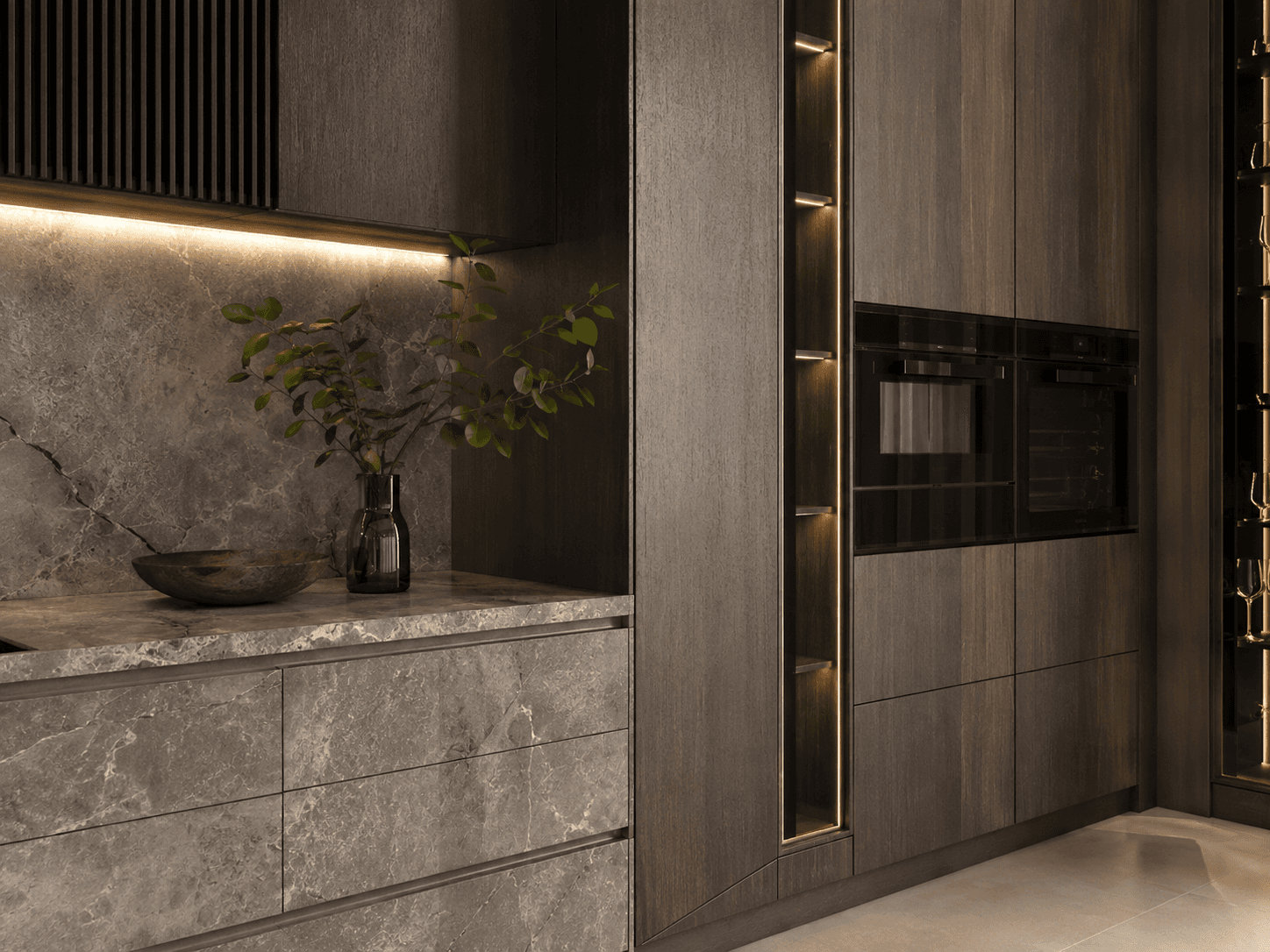 Precisely executed kitchen built-in with stone fronts and integrated lighting